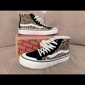 Size 6.5 high top, leopard print vans.